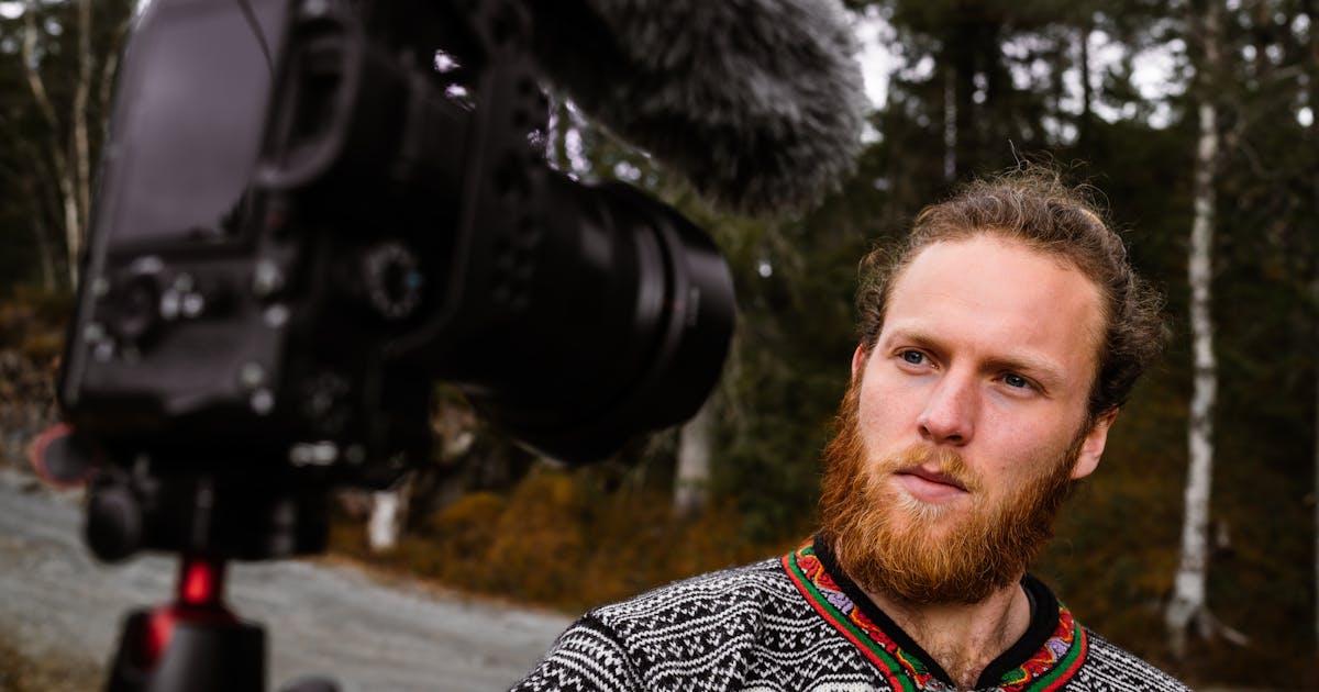 Content creator filming YouTube video with professional equipment for channel growth